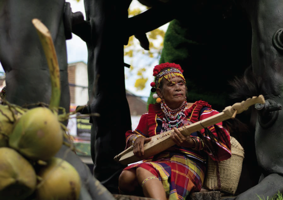 Elder members of the tribe either dance or provide musical accompaniment