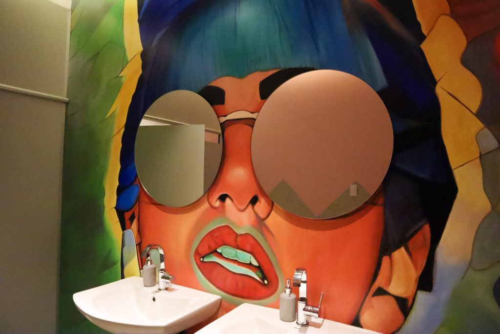 Washroom mural at the Hard Rock Café Manila